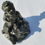 Скульптура "Мальчик с голубями", Курган
